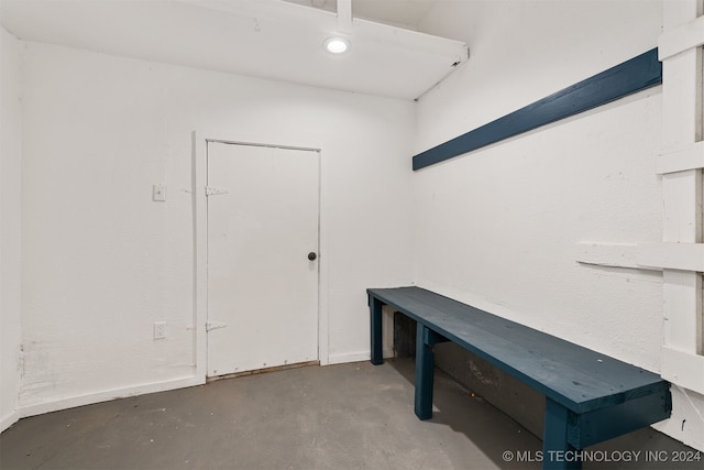 interior space featuring concrete flooring