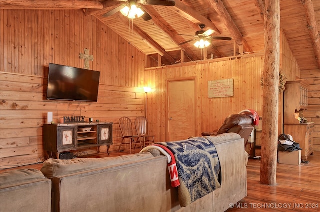 living room with ceiling fan, wood-type flooring, high vaulted ceiling, wooden ceiling, and beamed ceiling