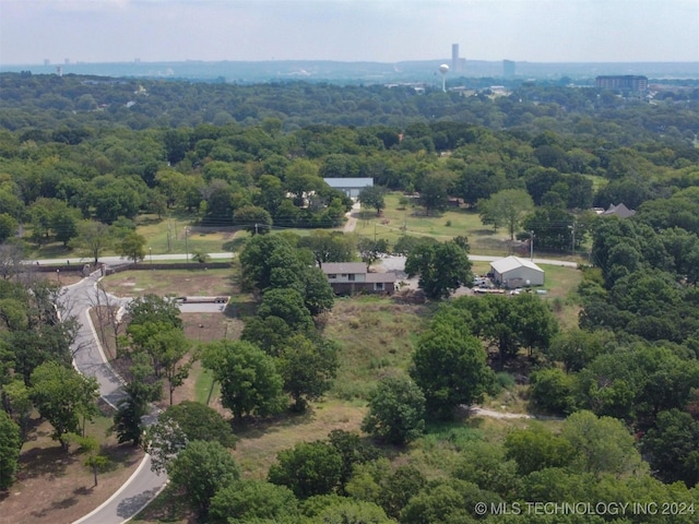 3406 Redbud Ln, Tulsa, OK 74132 - aerial view with a wooded view