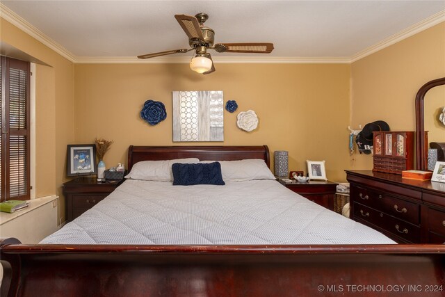 bedroom with crown molding, multiple windows, and ceiling fan