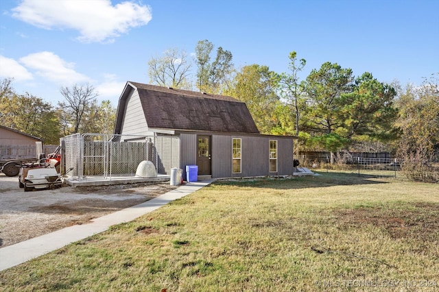 exterior space featuring a lawn