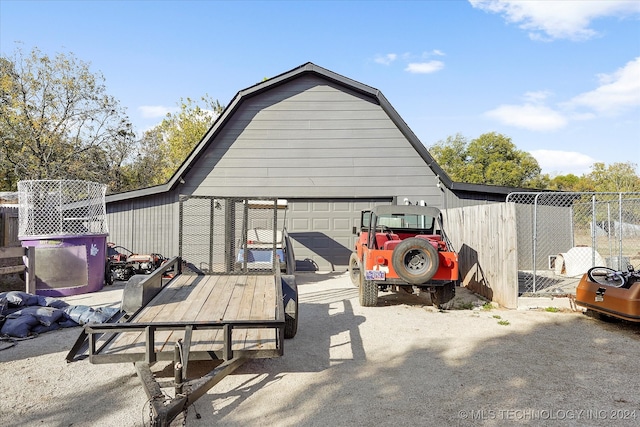 view of outbuilding with a garage