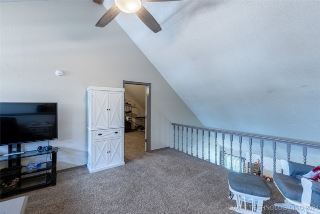 bonus room with ceiling fan, vaulted ceiling, and carpet floors