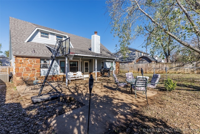 rear view of house featuring a patio