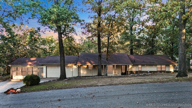 ranch-style home with a garage