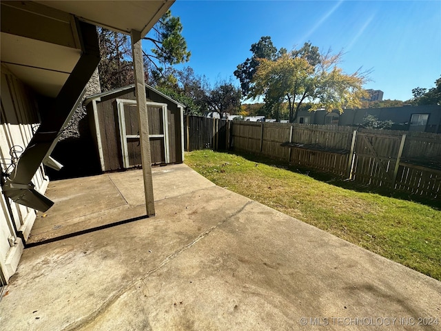 view of patio / terrace with a storage shed