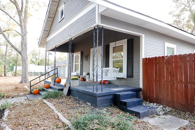 entrance to property with covered porch