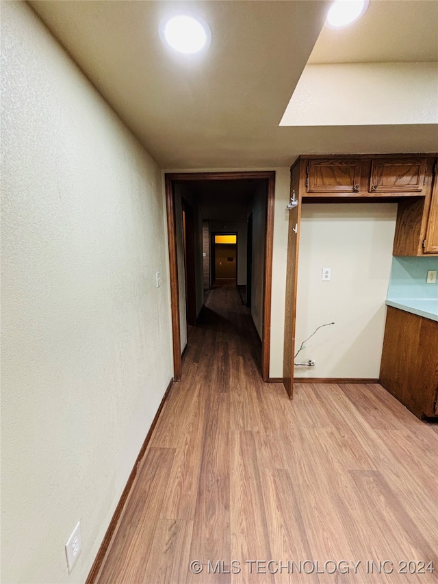 corridor featuring light hardwood / wood-style flooring