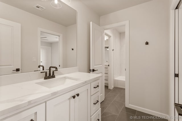 bathroom featuring vanity and tile patterned floors