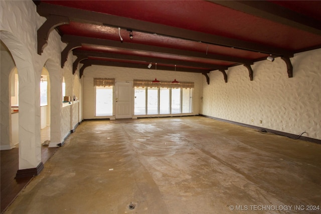 interior space with concrete flooring