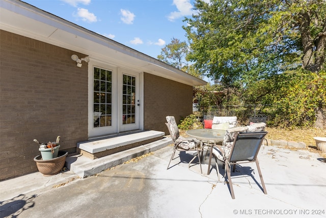 view of patio featuring french doors