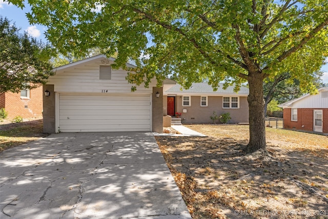 single story home with a garage