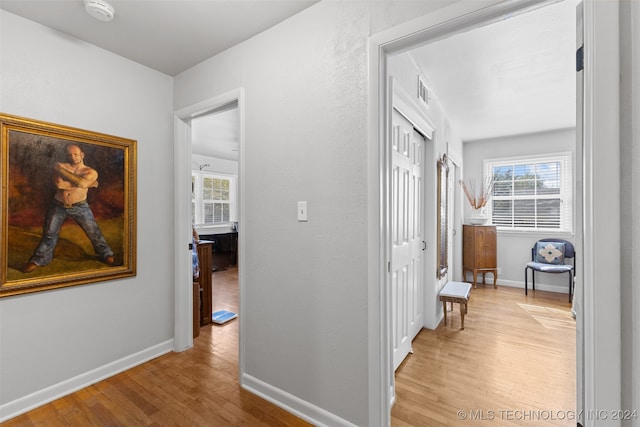 hall featuring light wood-type flooring