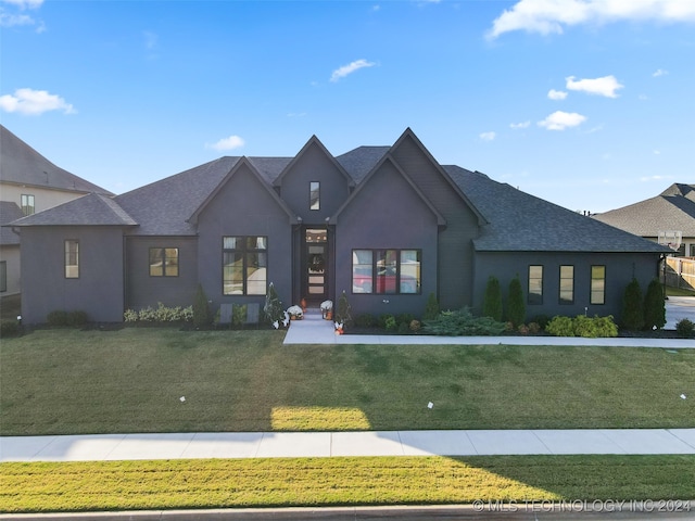 view of front of house with a front lawn