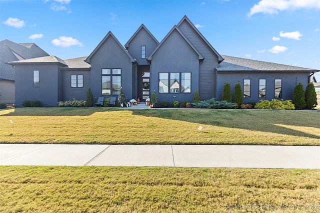 view of front facade with a front yard