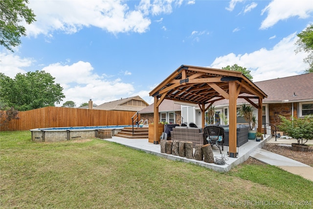 exterior space with a gazebo, an outdoor living space, a patio, and a fenced in pool