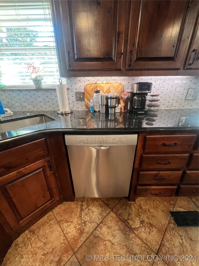 kitchen featuring tile patterned floors, dark brown cabinets, dishwasher, and tasteful backsplash