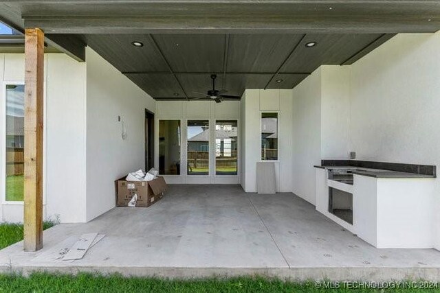 view of patio with ceiling fan