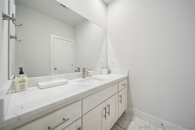 bathroom featuring vanity and tile patterned floors