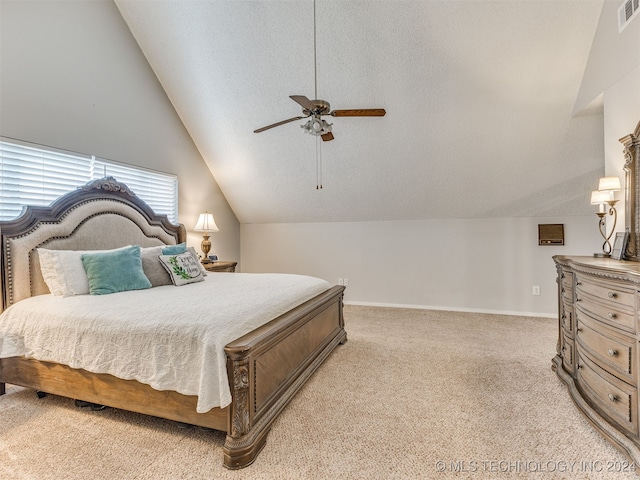 bedroom featuring light colored carpet, ceiling fan, and lofted ceiling