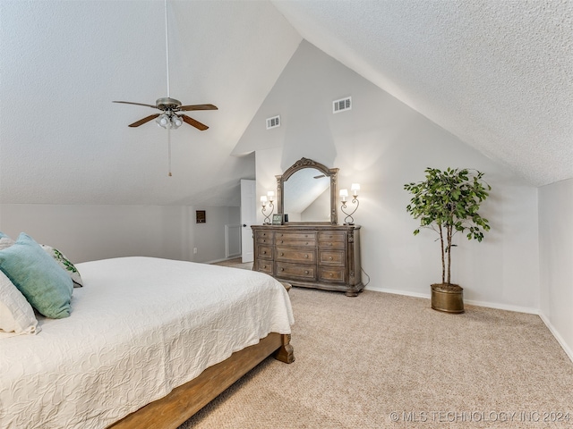 carpeted bedroom with ceiling fan and lofted ceiling