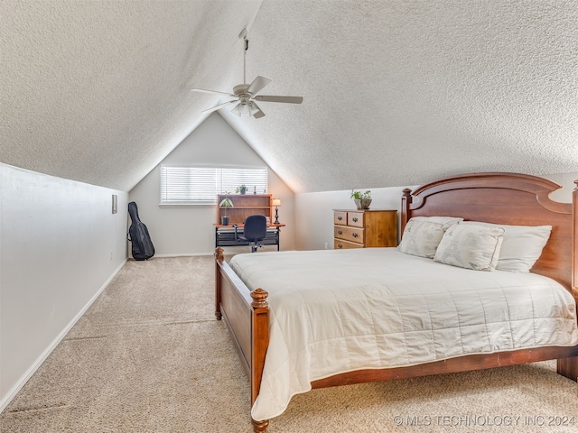 bedroom with light carpet, a textured ceiling, ceiling fan, and lofted ceiling