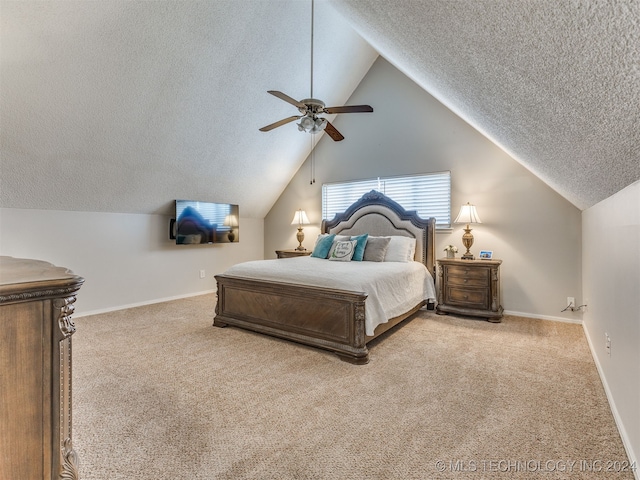 carpeted bedroom featuring a textured ceiling, ceiling fan, and lofted ceiling