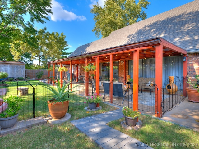 exterior space with a patio and a front lawn