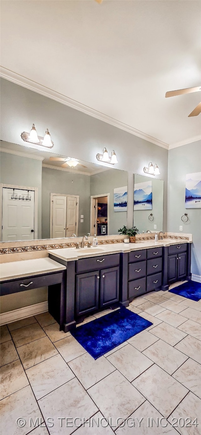 bathroom with vanity, ornamental molding, and ceiling fan