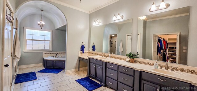 bathroom with a chandelier, vanity, crown molding, plus walk in shower, and tile patterned floors