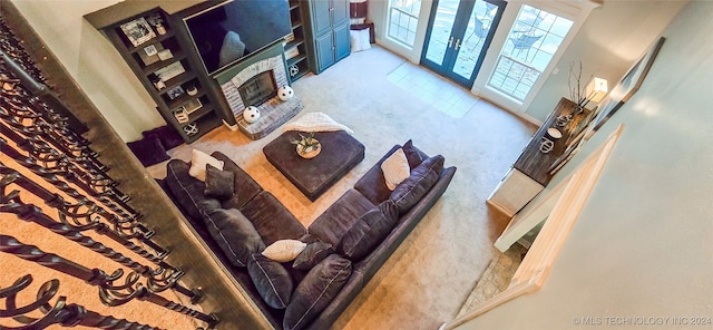 living room featuring a high ceiling