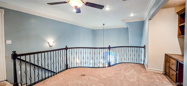 hall featuring ornamental molding and light carpet