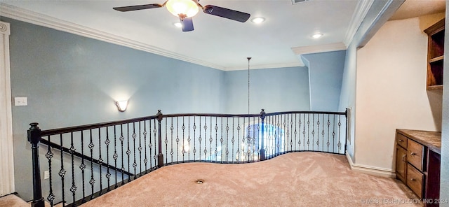 hallway with light carpet and crown molding