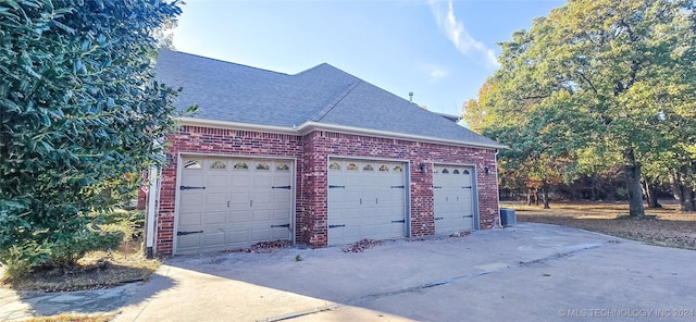 garage featuring central air condition unit