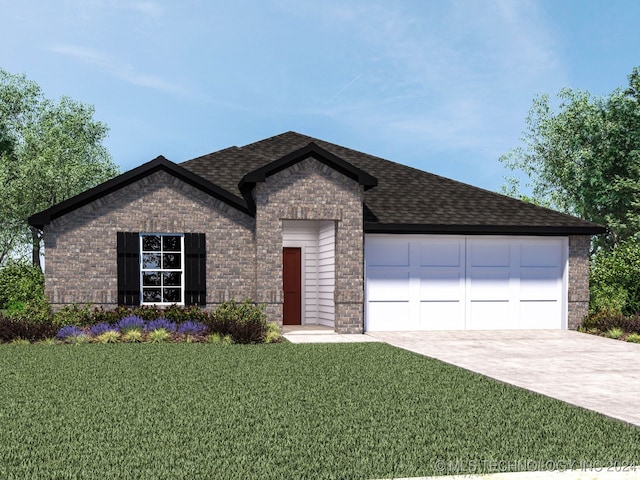 view of front of house with a garage and a front yard