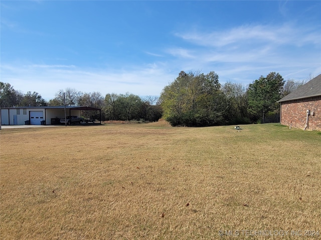 view of yard with a carport