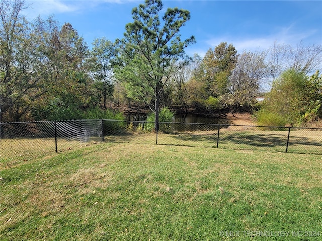 view of yard with a water view