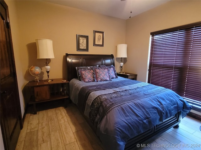 bedroom featuring light wood-type flooring