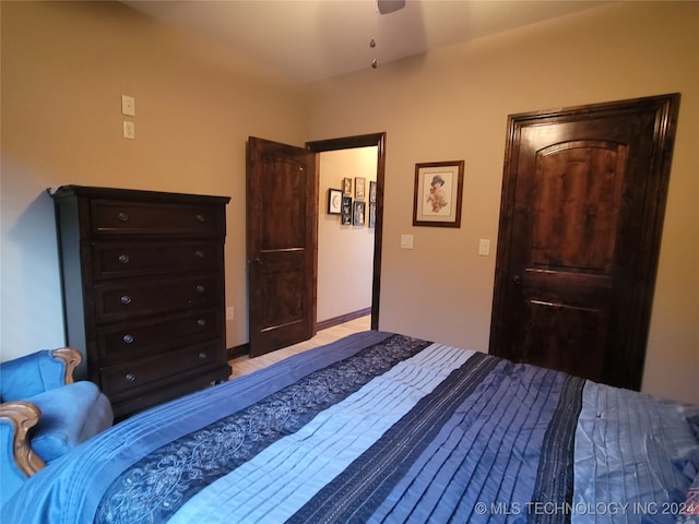 bedroom featuring ceiling fan