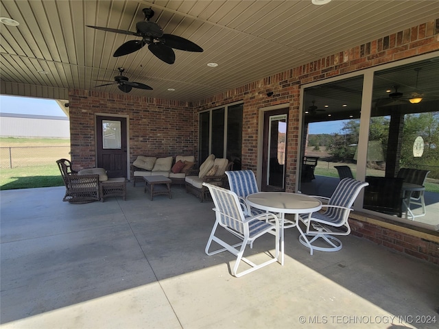 view of patio / terrace featuring outdoor lounge area and ceiling fan