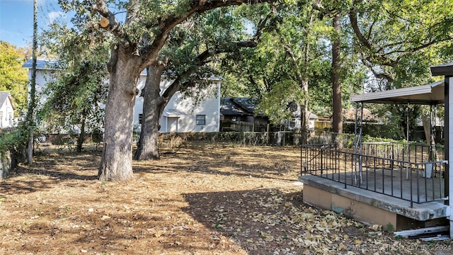 view of yard with a wooden deck