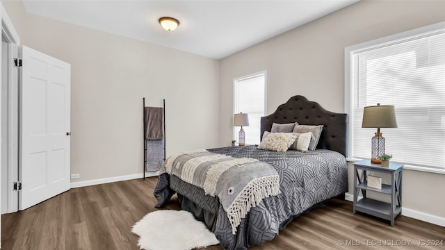 bedroom featuring hardwood / wood-style floors