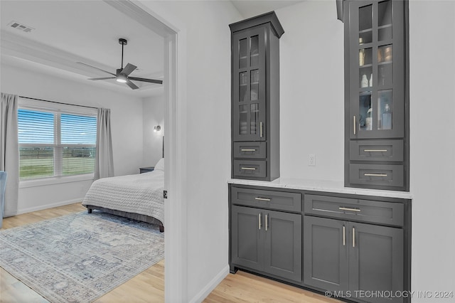 bedroom featuring ceiling fan and light hardwood / wood-style flooring