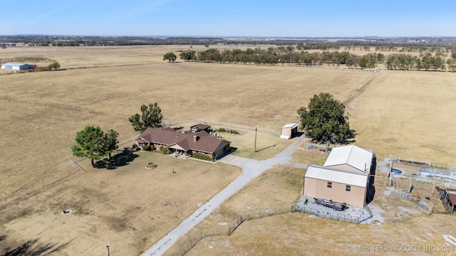 birds eye view of property featuring a rural view