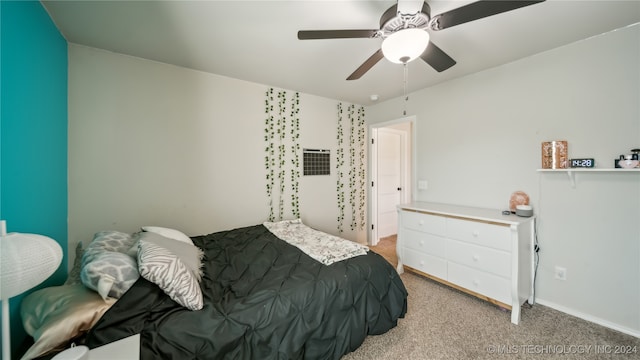 bedroom with light carpet and ceiling fan