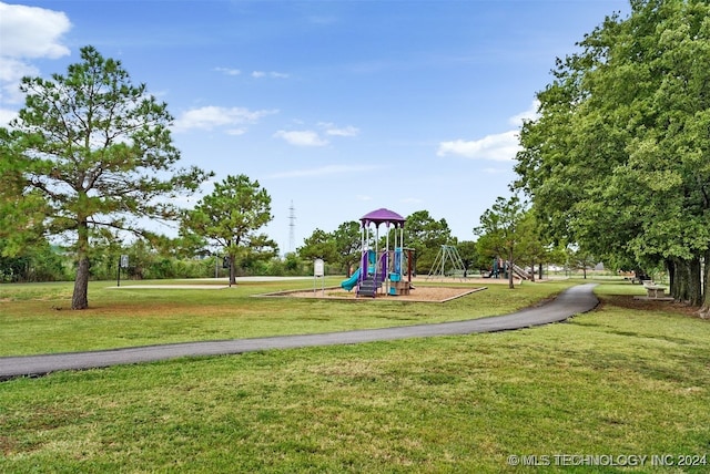 view of playground featuring a yard