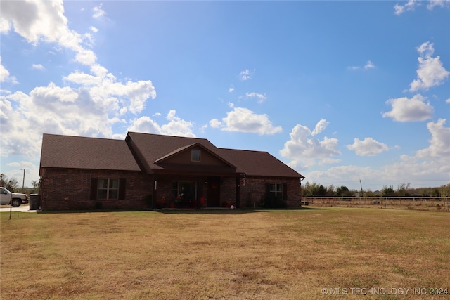 view of front of home with a front lawn