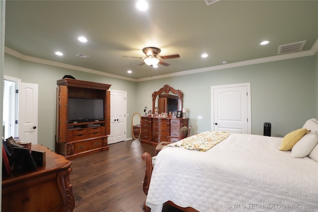 bedroom with ceiling fan, dark hardwood / wood-style flooring, and ornamental molding