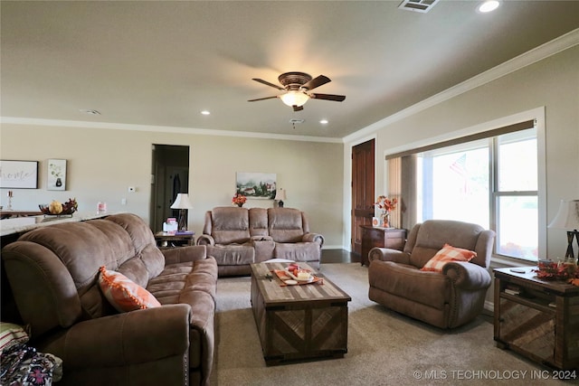 living room featuring light colored carpet, ceiling fan, and crown molding