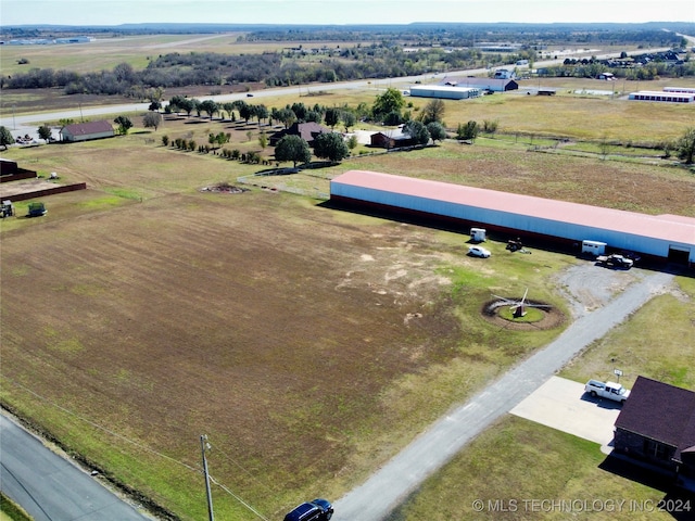 birds eye view of property featuring a rural view